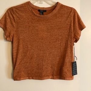 Orange shortsleeved crop top